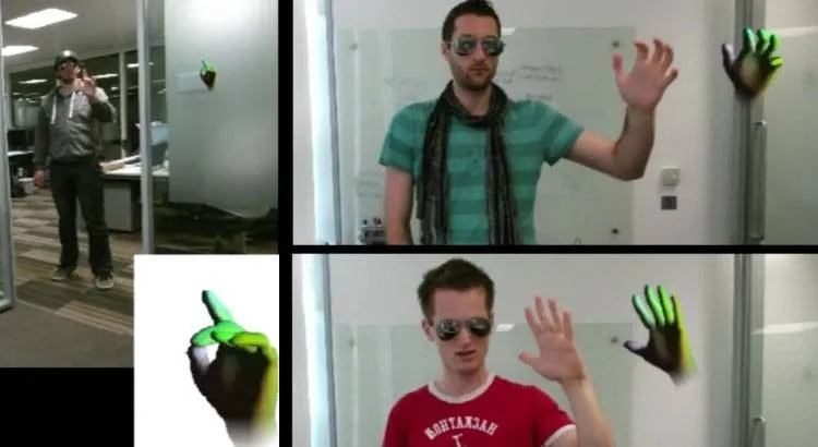 three men with their hands in the air using microsoft kinect finger tracking